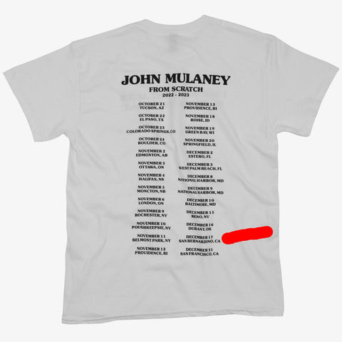 Back of white shirt with black text "JOHN MULANEY FROM SCRATCH 2022-2023" with tour dates below