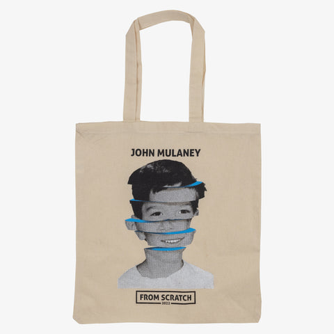 Tote bag with photo of John Mulaney as a kid on side and text "JOHN MULANEY FROM SCRATCH 2022"